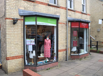 Shop window with a green banner at the top
