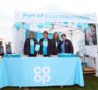 Team of Coop colleagues with stall