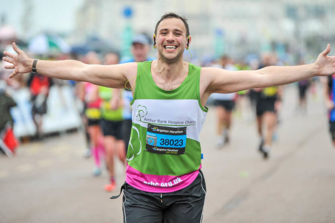 Marathon runner celebrating