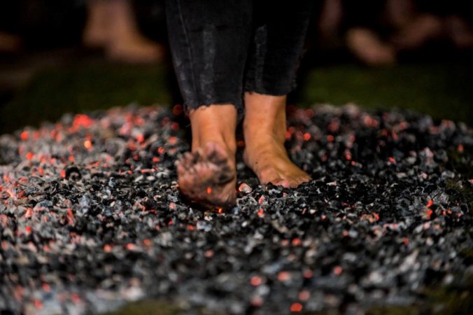 Bare feet on hot coals during firewalk