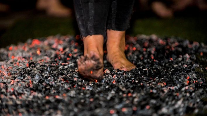 Bare feet on hot coals during firewalk
