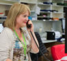 Nurse answering call in Arthur Rank Community Team's office
