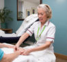 Complementary Therapist giving a hand massage