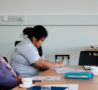 Nurse in uniform making notes