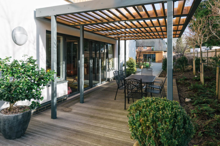 Decked area with table and chairs outside Inpatient Unit lounge