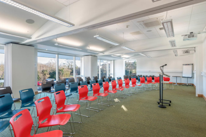 The Education & Conference Centre at Arthur Rank Hospice Charity set up as a Conference Room with a maximum capacity of 90 people. The room can also be divided into two or three smaller spaces.