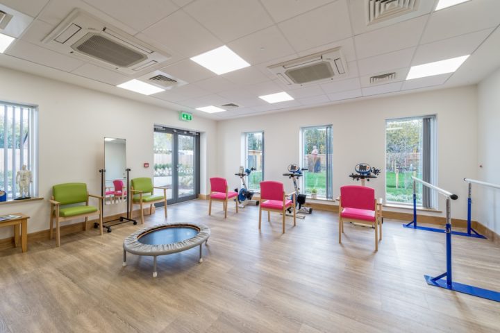 Light, bright gym with equipment