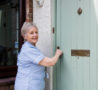 Nurse at the front door of someone's home