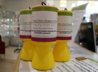 Yellow collection tins