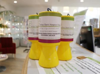 Yellow collection tins