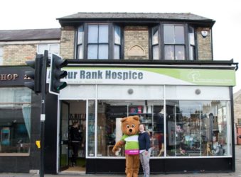 Arthur Bear and colleague outside Mill Road shop