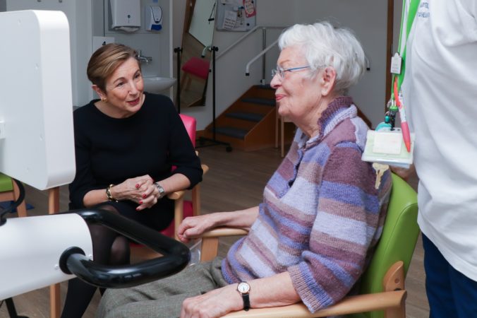 Lady Chadwyck-Healey meeting a Day Therapy patient in the physiotherapy gym