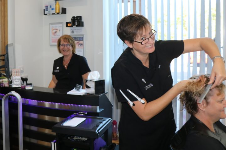 Nicola cutting hair in SalonHD