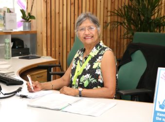 Volunteer Tina Shah in her role as volunteer Receptionist at the Arthur Rank Hospice