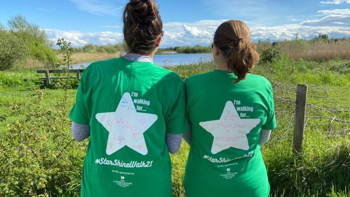 Two participants wearing Star Shine Walk t shirts