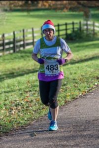 Jane Clarke a nurse at the Alan Hudson Day Treatment Centre taking part in the Arthur Rank Hospice Charity Ely Festive 5K in 2017