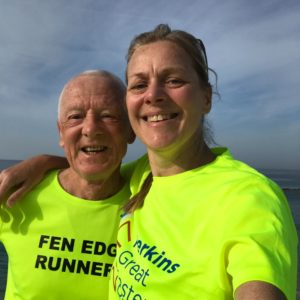 John and Wendy in their luminous yellow running tops