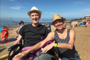 Wendy and John with sunhats on, on Hunstanton beach