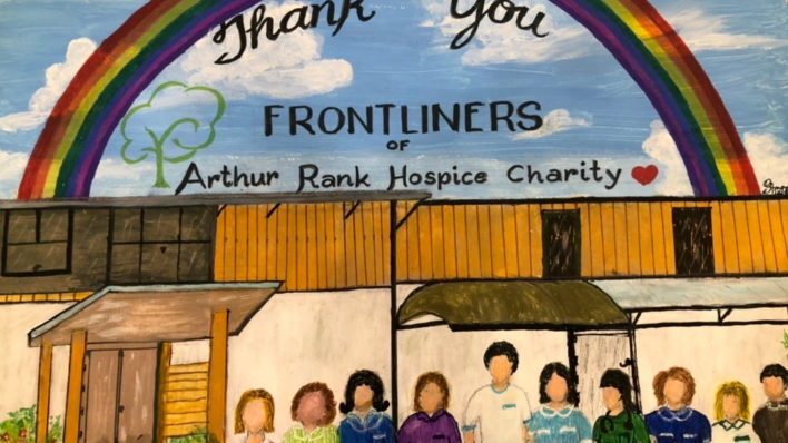 Painting with a rainbow above the Hospice and members of the team in uniform and the words 'Thank you Frontliners of Arthur Rank Hospice Charity' with a heart