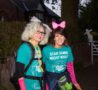 Two women dressed up for Star Shine Night Walk