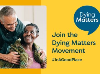 Dying Matters Movement with man and woman with a blanket smiling