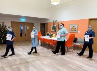 Nurses and staff walking around the In-Patient Unit at Arthur Rank Hospice