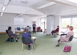 Colleagues at the Arthur Rank Hospice Charity are given a training session on the new video conferencing equipment, which was funded by Citrix and has been installed to the facility during the third lockdown. 