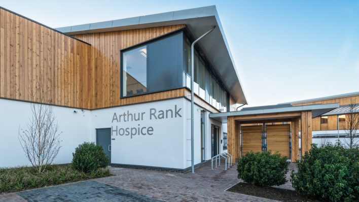 The front of Arthur Rank Hospice Charity’s home at Shelford Bottom: the Education and Conference Centre is based in the rooms with large windows above the entrance.