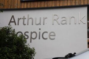 Laine's photo of the Arthur Rank Hospice sign outside the building