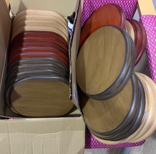 Wooden discs in a box of various colours, red, white and brown