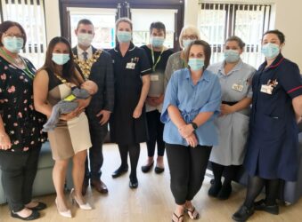 The Mayor of Wisbech, his wife, baby son and nursing staff at the alan Hudson Day Treatment Centre in Wisbech
