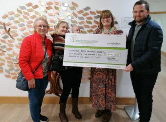 Ros, Katie, Teddy, Alison and Robert with large cheque