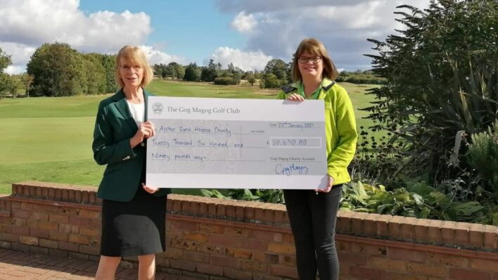 Ros and Alison holding cheque at Gog Magog golf cheque presentation