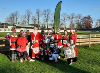 Group of adults in Christmas fancy dress