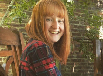 Amber smiling in garden at home