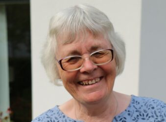 Female wearing glasses smiling