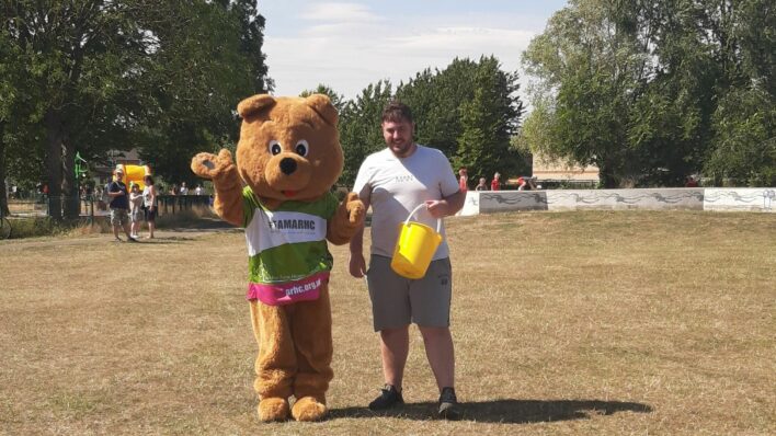 Life sized bear and a man