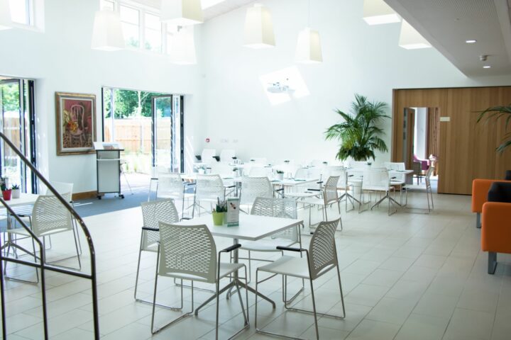 White table and chairs in a bright space