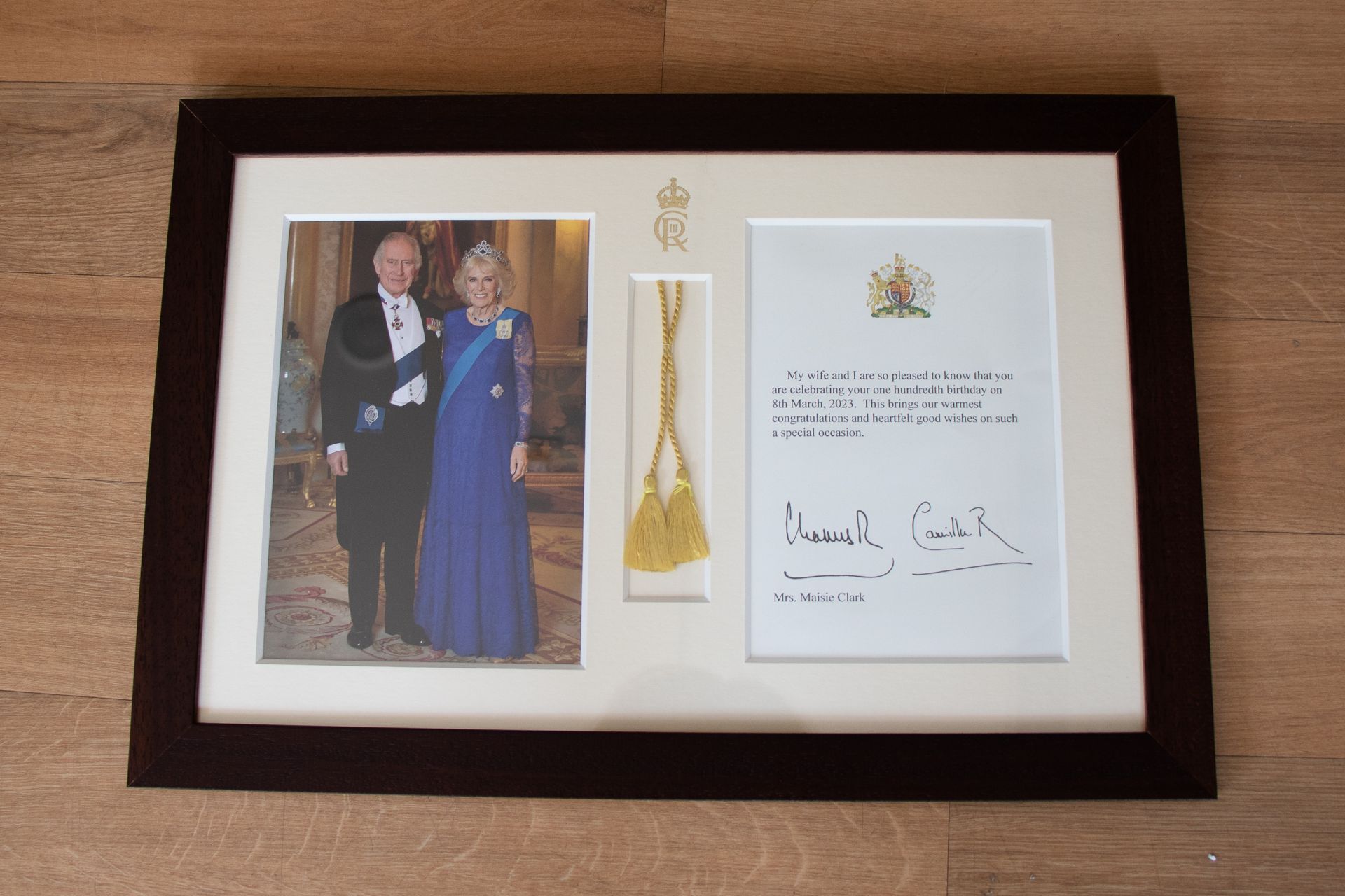 Framed photo of King Charles III and the Queen Consort with a personalised card 