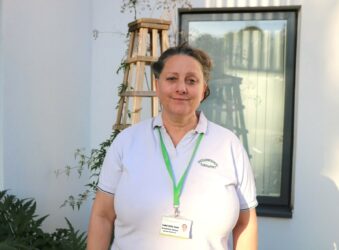 Nurse standing outside the Hospice