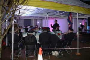 Salvation Army band playing in an Arthur Rank Hospice gazebo
