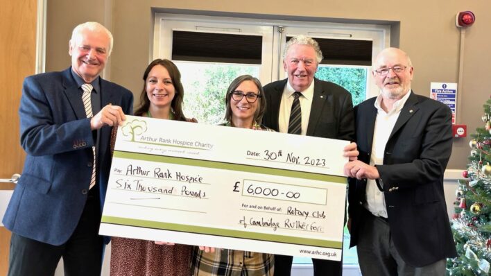 five individuals holding a £6000 giant cheque for ARHC