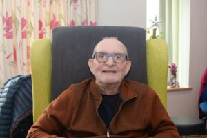 Male sitting in a chair, 