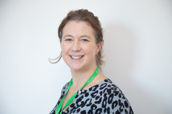 Headshot of a Female smiling a the camera