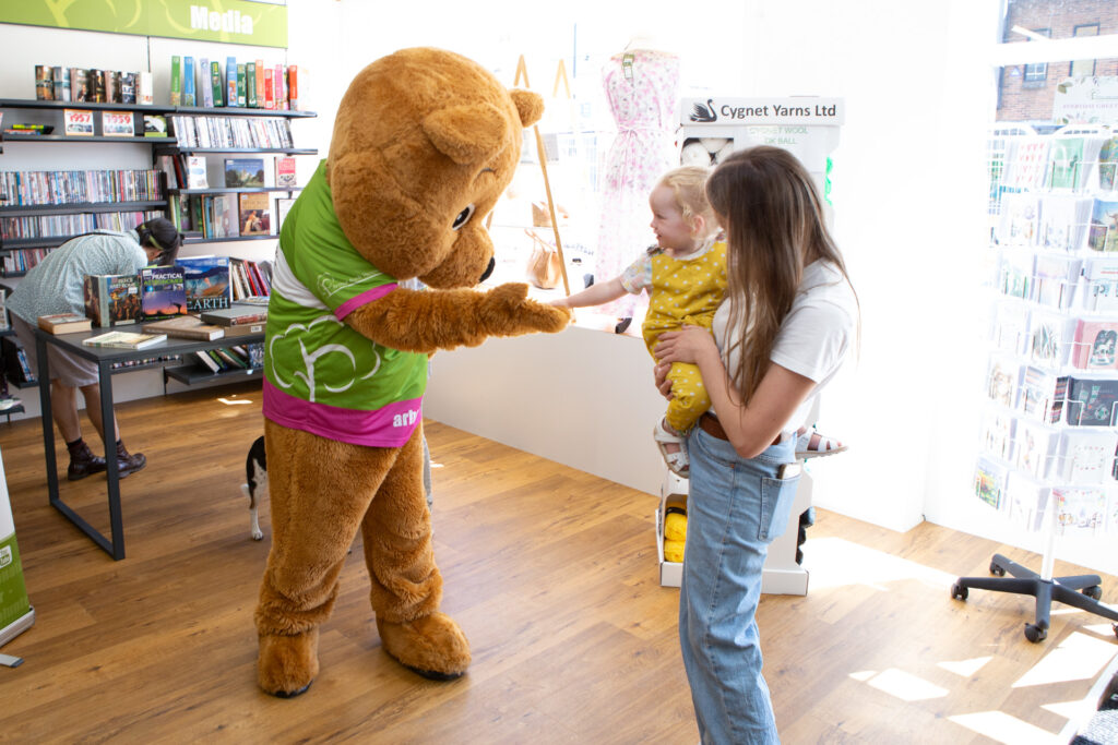 Life sized bear and child and female 