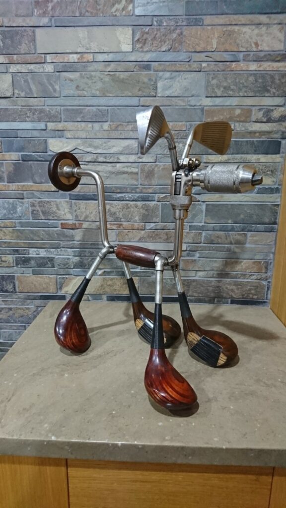 Golf clubs in the shape of a dog! 