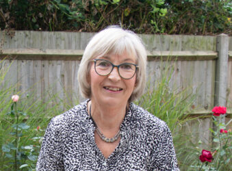 Female wearing glasses outside in the garden