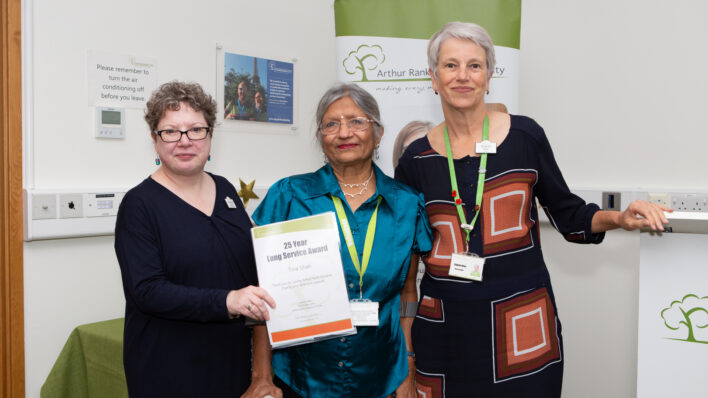 3 females holding a certificate