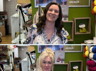 Two females behind a counter