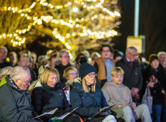Group of people outside near lights